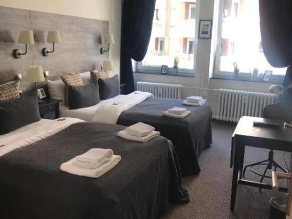 Hamburg Room : photo 1 de la chambre chambre quadruple avec douche