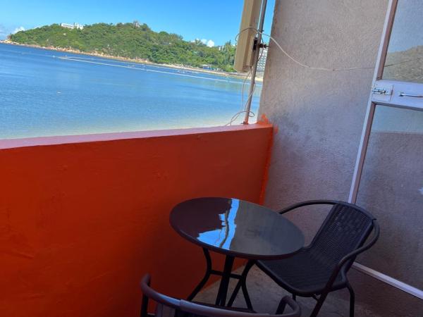 Fong Che Ho Hau Summer House : photo 1 de la chambre chambre lit queen-size - vue sur mer