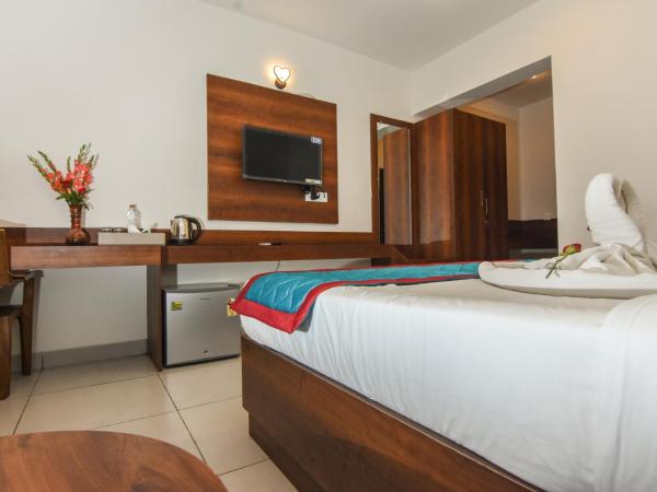 Suraksha Stay Whitefield Hotel : photo 2 de la chambre chambre lit king-size supérieure