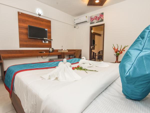 Suraksha Stay Whitefield Hotel : photo 2 de la chambre chambre familiale avec balcon