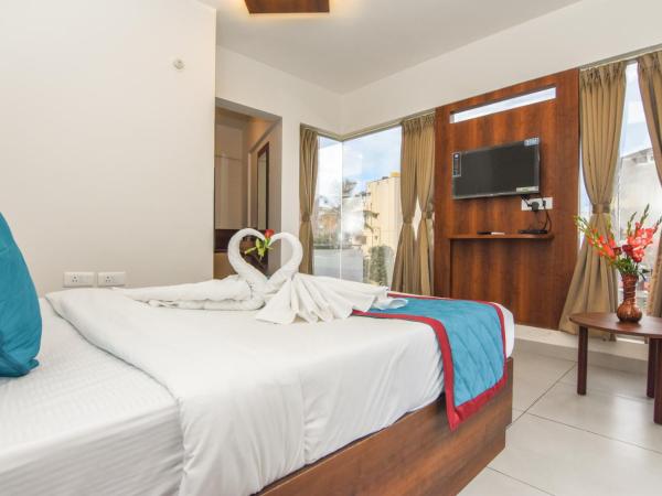 Suraksha Stay Whitefield Hotel : photo 2 de la chambre chambre double deluxe avec vue sur château