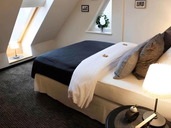 Sleephotels : photo 1 de la chambre chambre double avec salle de bains commune