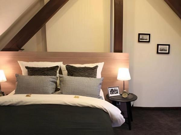 Sleephotels : photo 1 de la chambre chambre quadruple avec salle de bains commune