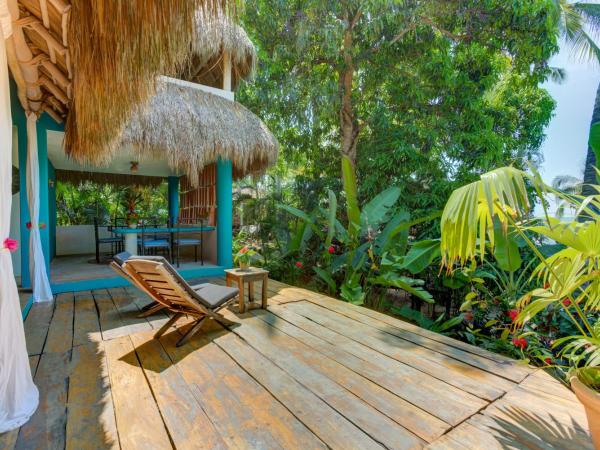 Casitas Maraika : photo 5 de la chambre chambre double ou lits jumeaux deluxe - vue sur mer