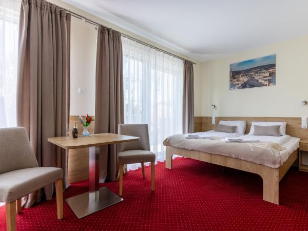 KIWI Sopot Apartments : photo 1 de la chambre chambre quadruple confort