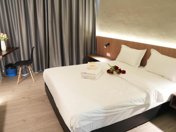 Roxy Hotel Aiman : photo 2 de la chambre chambre supérieure lit queen-size