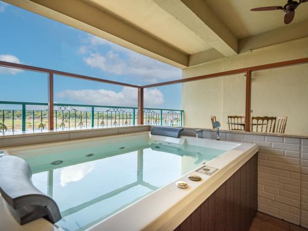 Tasik Villa International Resort : photo 4 de la chambre jacuzzi de luxe