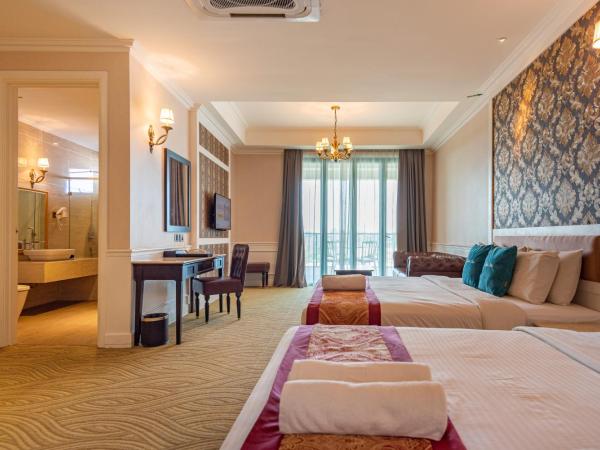 Tasik Villa International Resort : photo 5 de la chambre jacuzzi de luxe