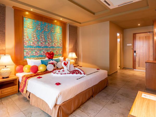 Tasik Villa International Resort : photo 1 de la chambre chalet honeymoon