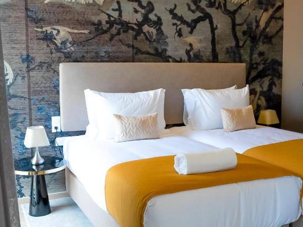 Guest House Jacarandá Faro : photo 2 de la chambre chambre lits jumeaux