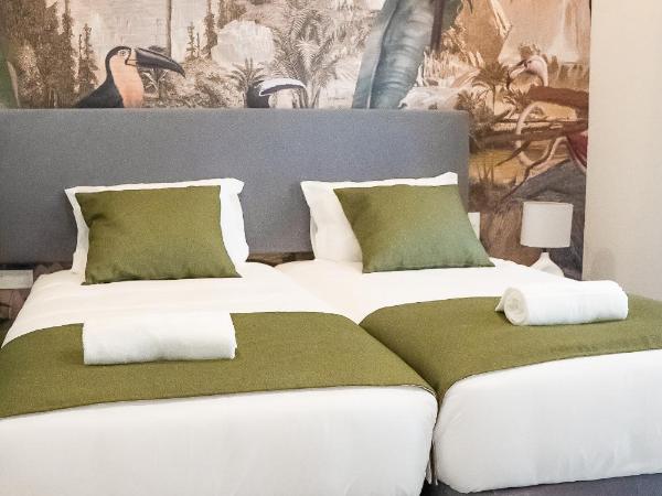 Guest House Jacarandá Faro : photo 9 de la chambre chambre lits jumeaux