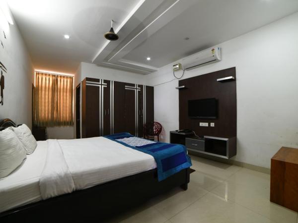 Hitech Shilparamam Guest House : photo 3 de la chambre chambre double