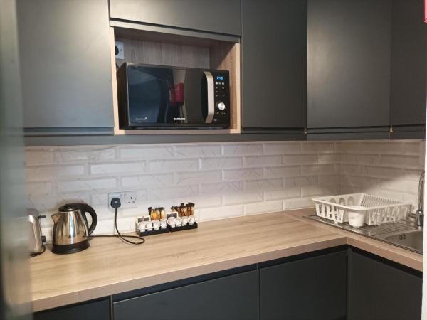 Tom Dick and Harriet's Accommodation : photo 2 de la chambre appartement - rez-de-chaussée