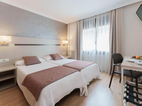 Hotel & Aparthotel Cosmos : photo 1 de la chambre chambre lits jumeaux