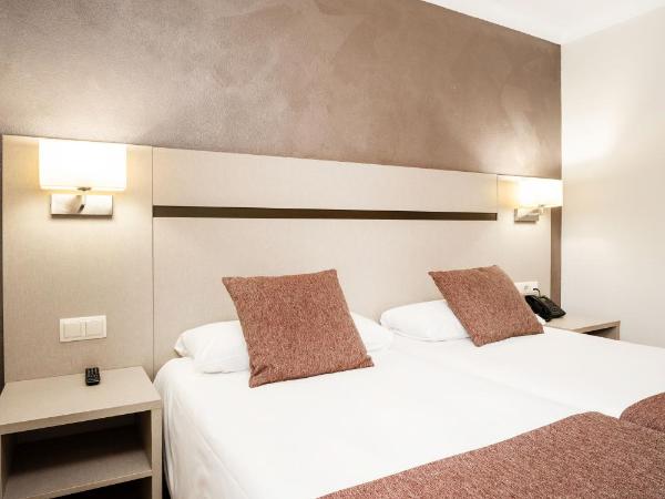 Hotel & Aparthotel Cosmos : photo 5 de la chambre chambre lits jumeaux
