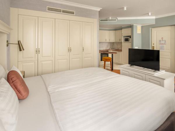 Queen's Court Hotel & Residence : photo 3 de la chambre suite junior