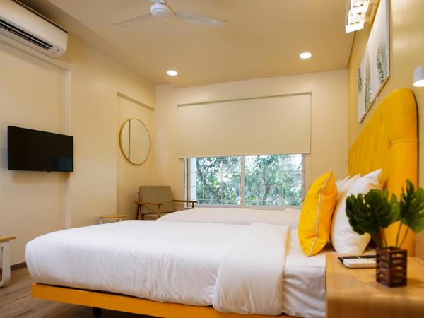 Bloom Hotel Koregaon Park : photo 1 de la chambre chambre lits jumeaux standard