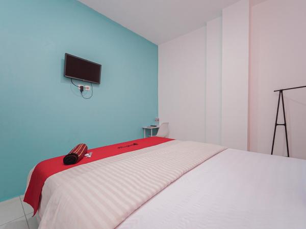 RedDoorz at MN One Residence : photo 7 de la chambre chambre deluxe