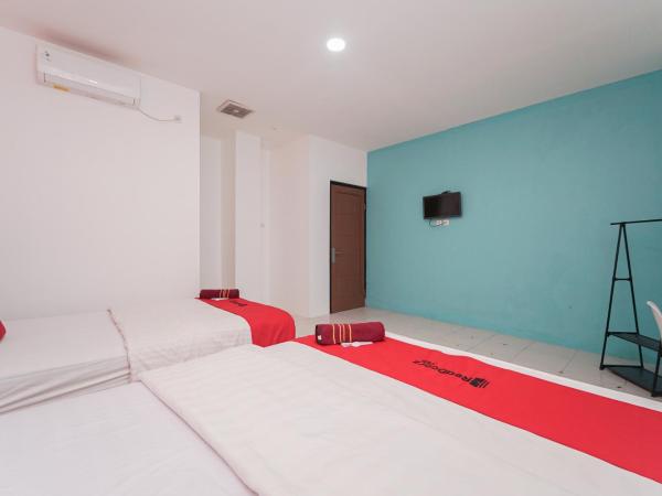 RedDoorz at MN One Residence : photo 5 de la chambre chambre familiale