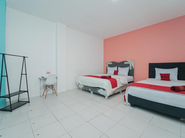 RedDoorz at MN One Residence : photo 2 de la chambre chambre familiale