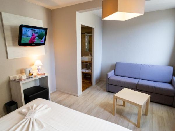 The Originals Boutique, Hôtel Neptune, Berck-sur-Mer : photo 1 de la chambre chambre quadruple