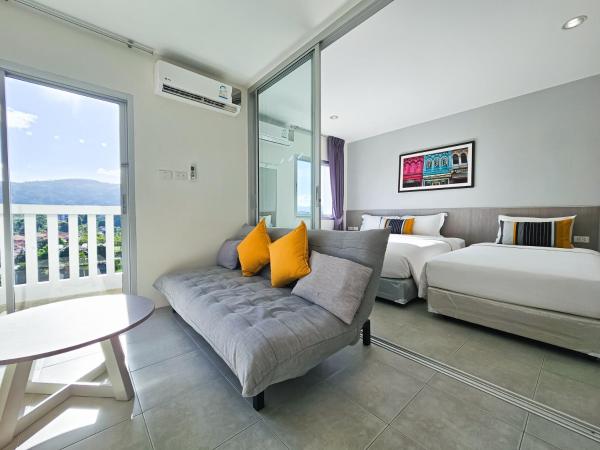 Recenta Suite Phuket Suanluang : photo 1 de la chambre chambre familiale deluxe