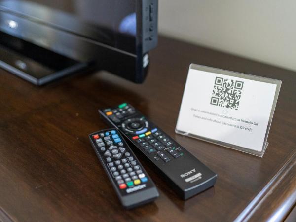 Il Castellaro Country House : photo 4 de la chambre chambre double avec lit d'appoint