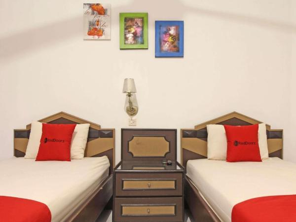 RedDoorz near Pojok Beteng Prawirotaman : photo 3 de la chambre chambre lits jumeaux
