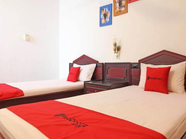 RedDoorz near Pojok Beteng Prawirotaman : photo 3 de la chambre chambre lits jumeaux deluxe
