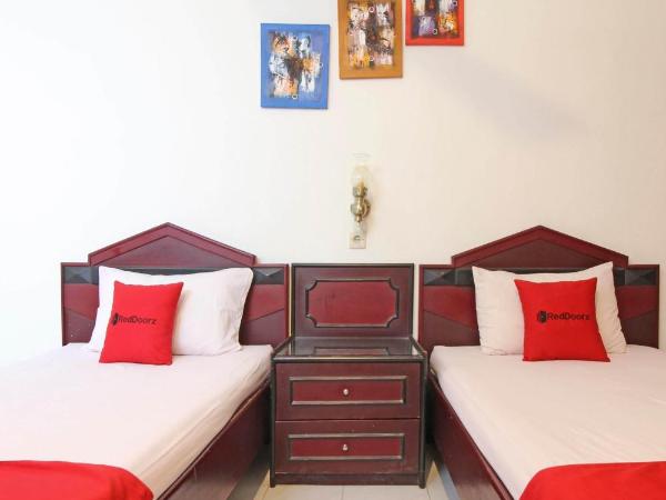 RedDoorz near Pojok Beteng Prawirotaman : photo 4 de la chambre chambre lits jumeaux deluxe