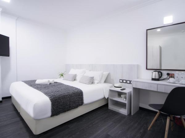 Harbour Ville Hotel - Hamilton : photo 4 de la chambre chambre lit king-size