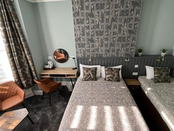 Charlotte Guest House : photo 10 de la chambre chambre triple