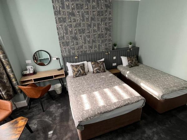 Charlotte Guest House : photo 4 de la chambre chambre triple