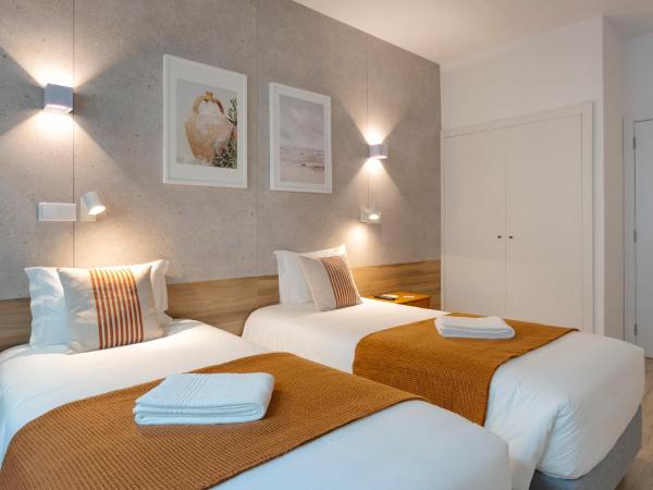 Hotel Made inn Faro : photo 9 de la chambre chambre lits jumeaux