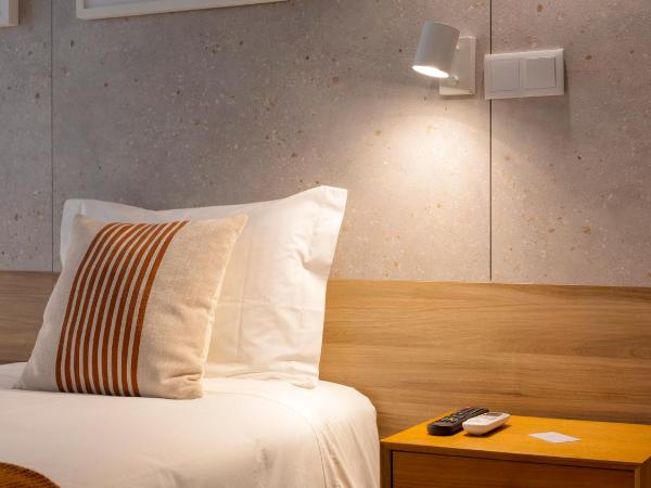 Hotel Made inn Faro : photo 7 de la chambre chambre lits jumeaux