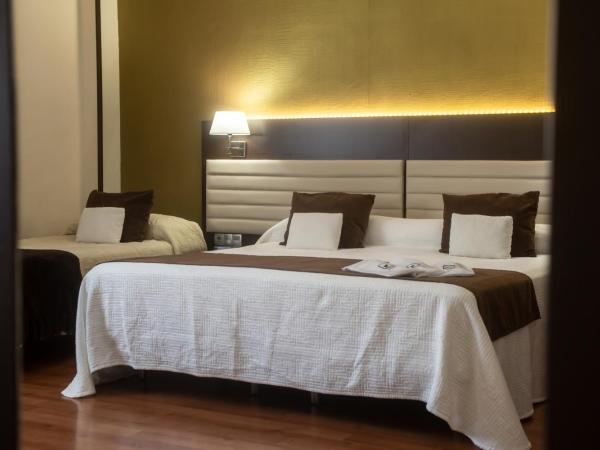 Hotel Monte Puertatierra : photo 6 de la chambre chambre lits jumeaux avec lit d’appoint - 301