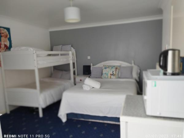 Blue Palms : photo 2 de la chambre chambre familiale