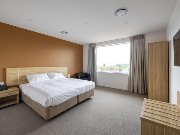 Manha Hotel Auckland Airport : photo 1 de la chambre chambre lit king-size - accessible aux personnes à mobilité réduite