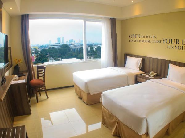 MK Hotel Jakarta : photo 2 de la chambre chambre deluxe double ou lits jumeaux