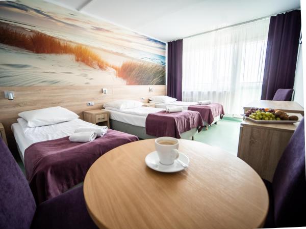 Sanatorium Perla Baltyku : photo 1 de la chambre chambre triple standard