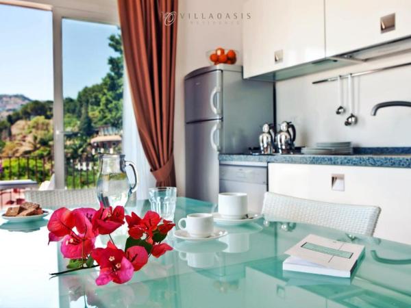 Taormina Villa Oasis Residence : photo 9 de la chambre suite penthouse avec jacuzzi extérieur