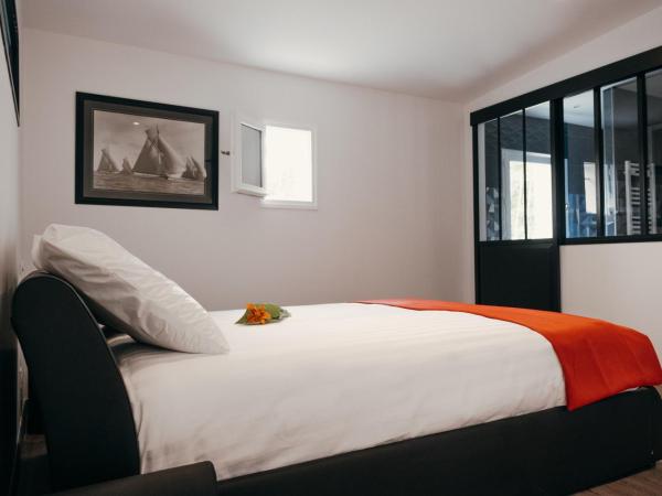 LA MAISON CACHEE-BA : photo 4 de la chambre suite - vue sur jardin