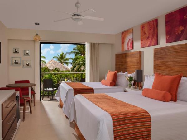 Sunscape Sabor Cozumel : photo 4 de la chambre hébergement double deluxe - vue tropicale