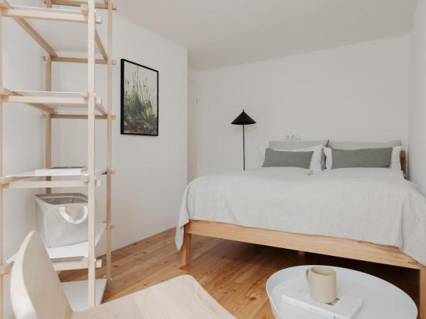 Das Grüne Haus - Boutique Apartments ecofriendly : photo 5 de la chambre chambre familiale - vue sur montagne