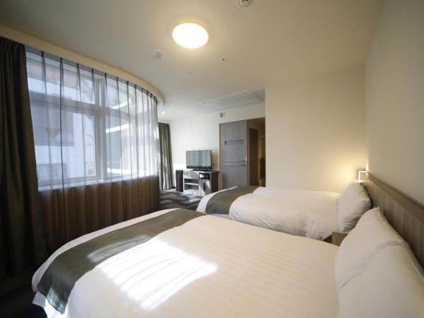 Dormy Inn Korakuen : photo 5 de la chambre chambre lits jumeaux d'angle - non-fumeurs