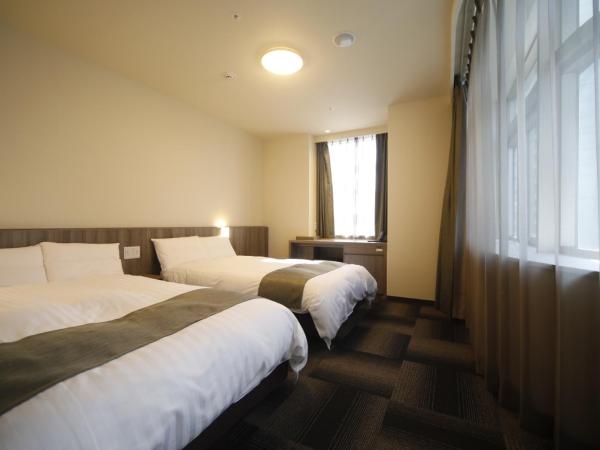 Dormy Inn Korakuen : photo 4 de la chambre chambre lits jumeaux d'angle - non-fumeurs