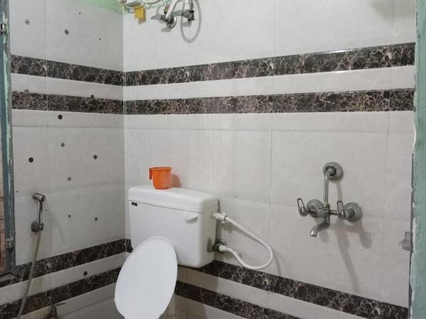 Superinn home stay& guest house : photo 2 de la chambre chambre double deluxe avec baignoire