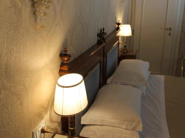 Hotel Palazzo Abadessa : photo 1 de la chambre chambre supérieure - vue sur jardin