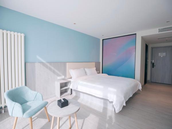 Beijing Saga Hotel : photo 4 de la chambre chambre lit king-size supérieure