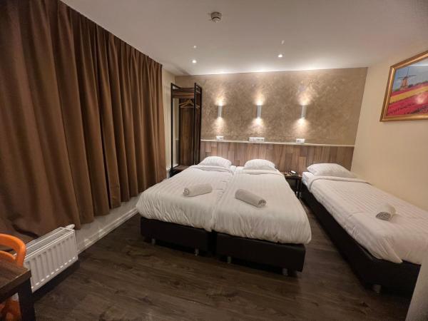 Orange Tulip Hotel : photo 2 de la chambre chambre triple avec salle de bains privative